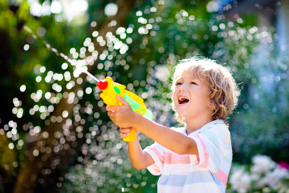 Playing with bubble guns can help your child’s overall development.